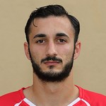T. Vella